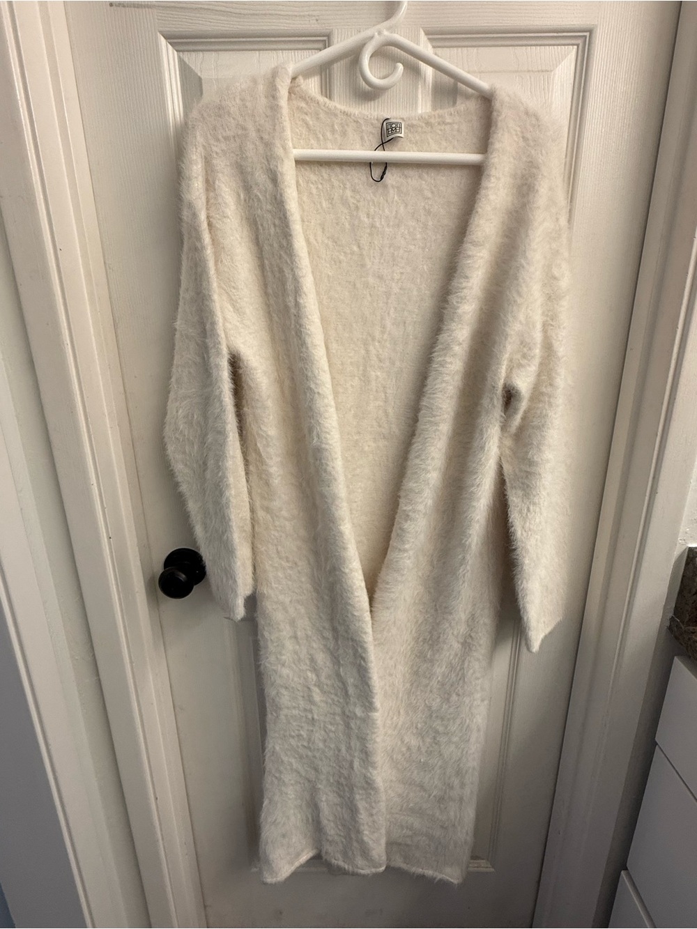 Toteme Soft Duster Sweater  in Light Cream
78% Alpaca